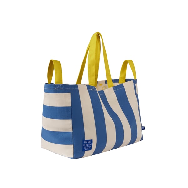 mustela-solar-saco-praia.webp